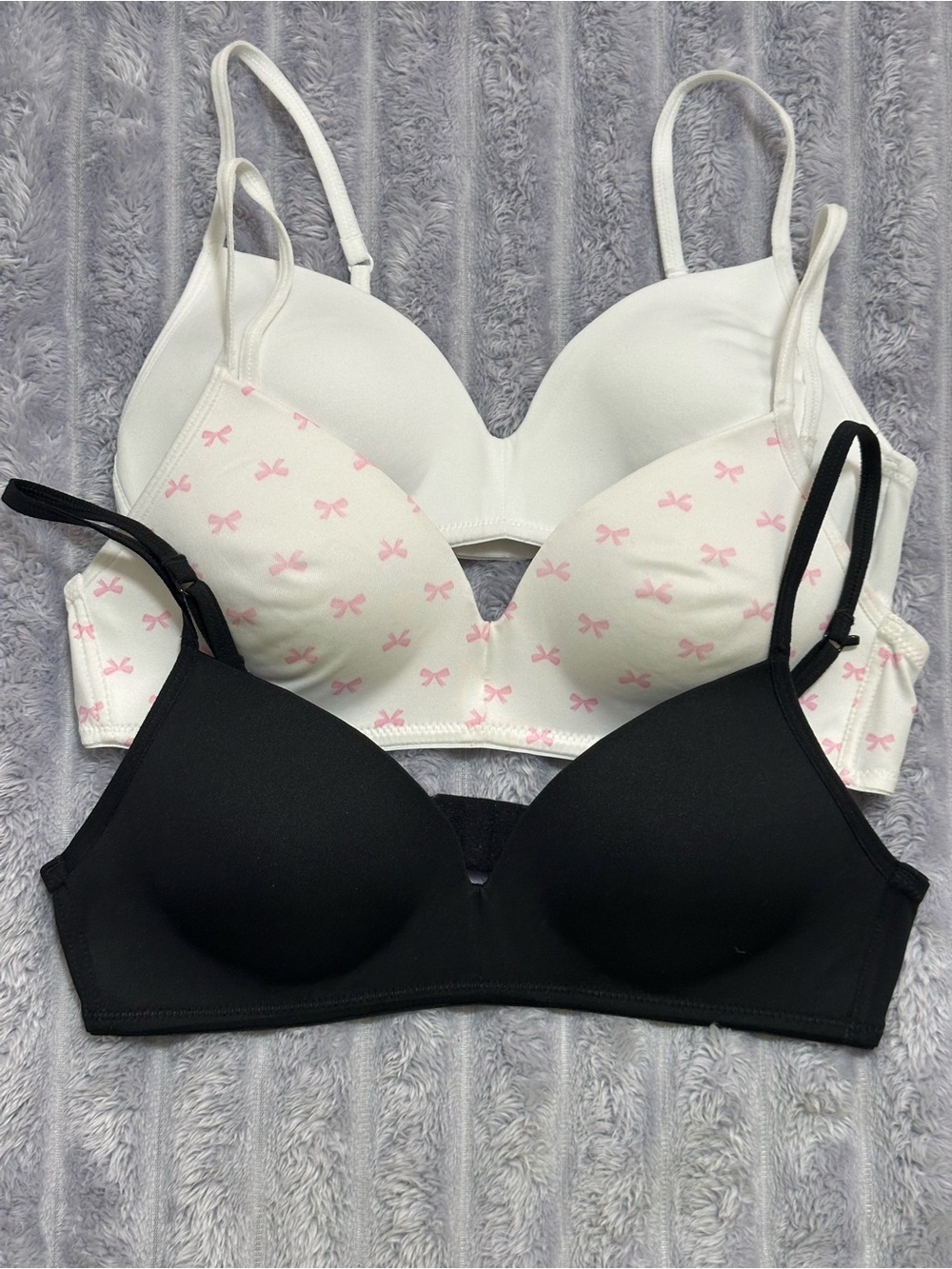 Hanes 3-Pack Seamless Bras in White, White with Pink Bow Print, and Black